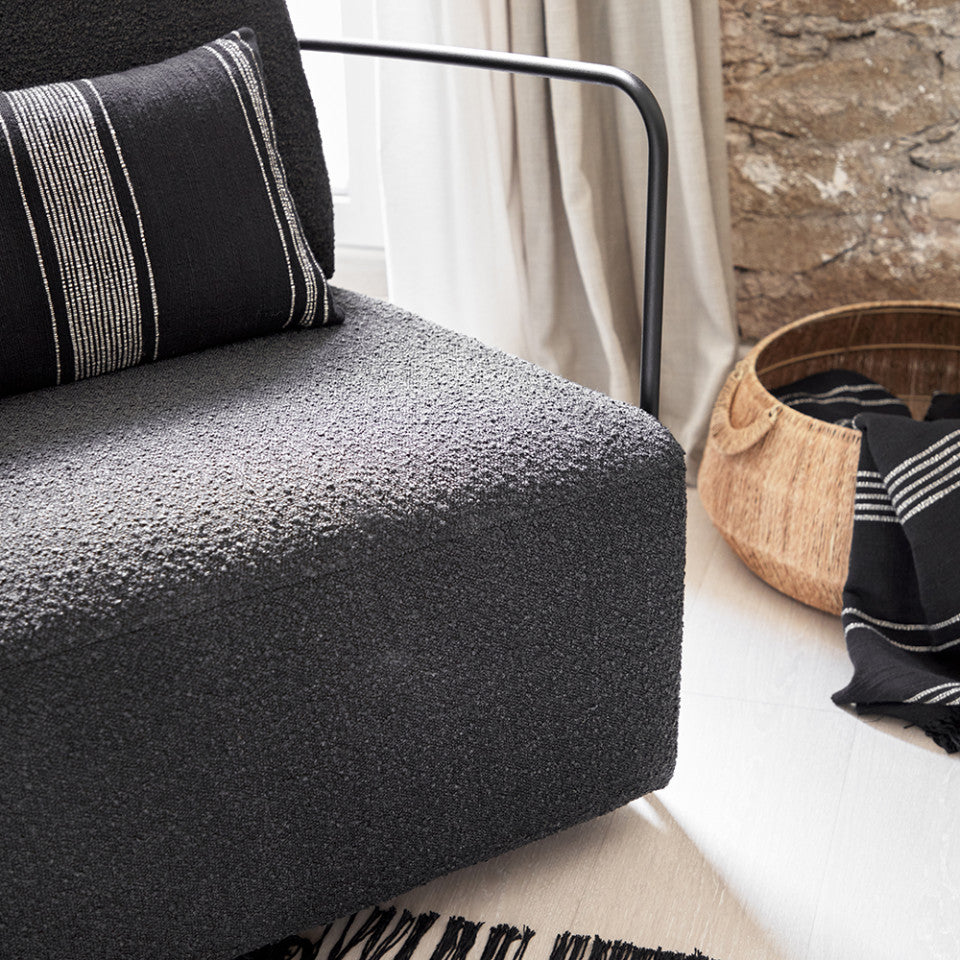Fotoliu negru din textil Gamer Shearling Kave Home