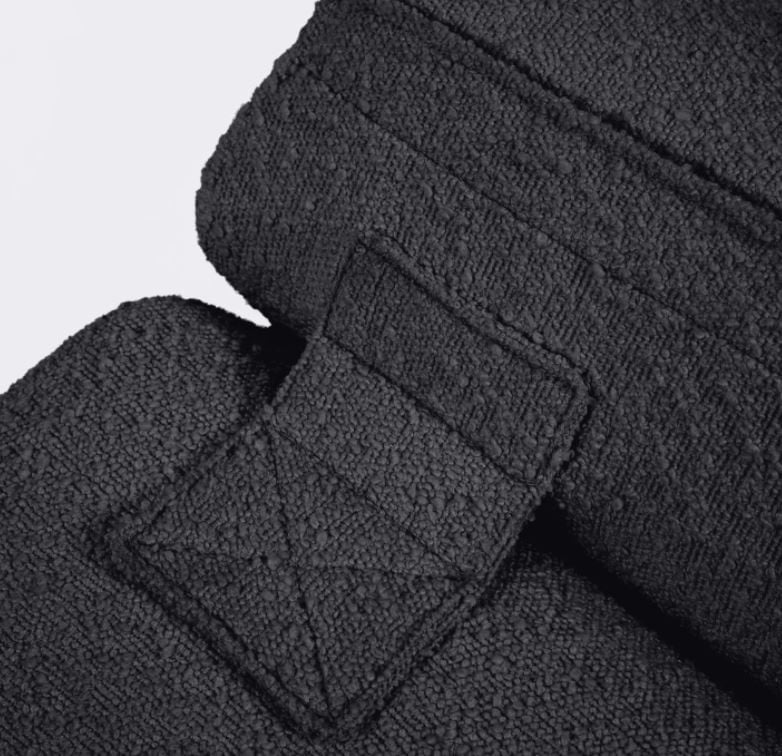 Fotoliu negru din textil Club Kave Home