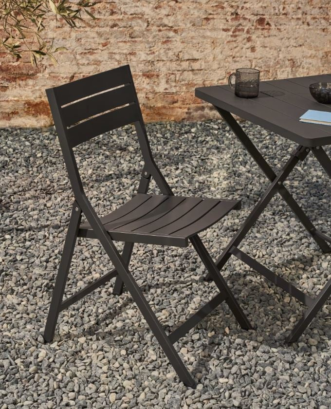 Scaun exterior dining pliabil negru din metal Torreta Kave Home