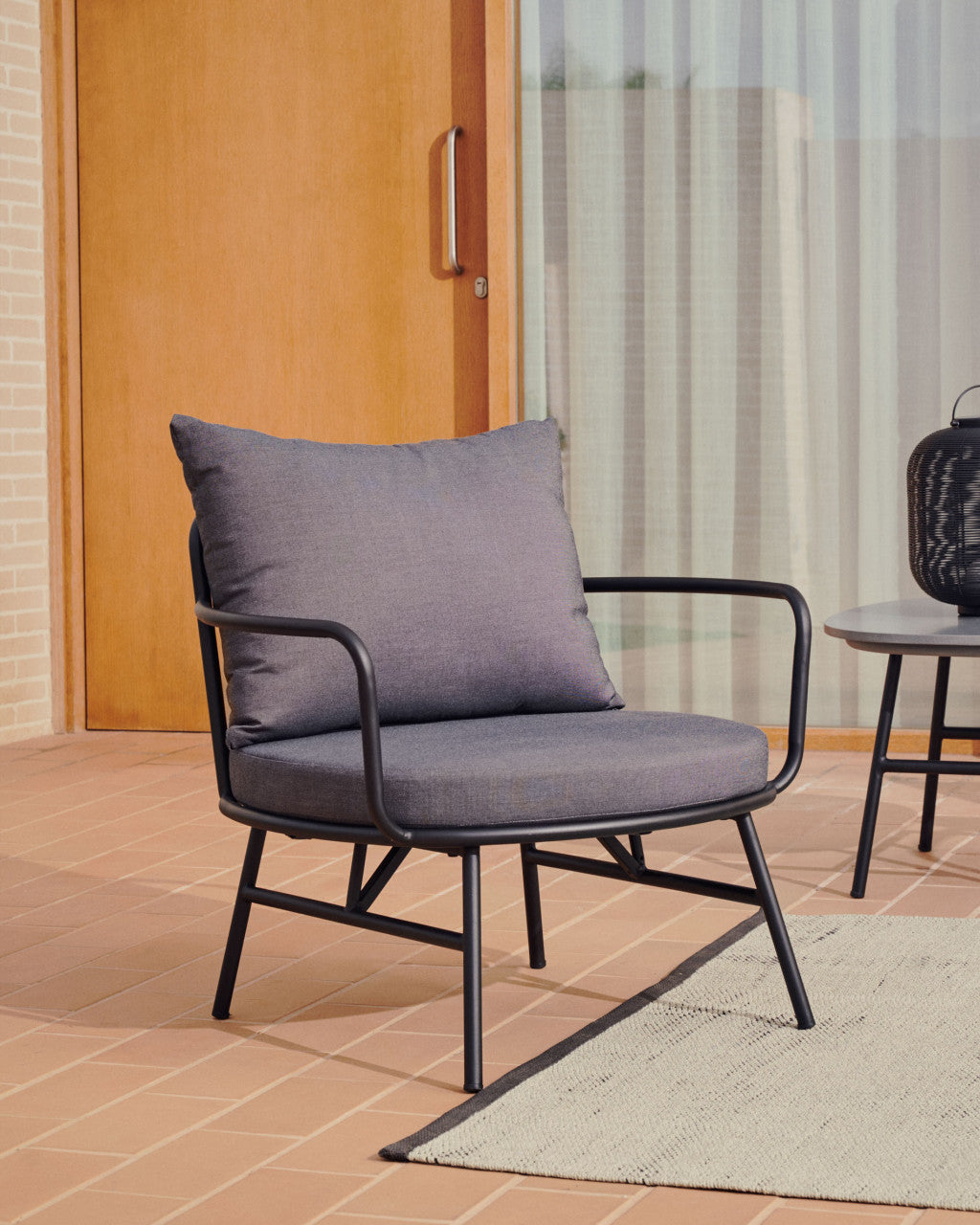 Scaun exterior negru din textil Bramant Kave Home